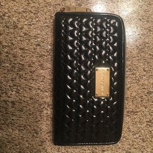 Betsey Johnson black wallet with stitches hearts.
